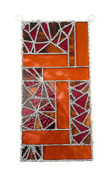 Add a pop of colour to your home decor with this Lekoky stained glass panel, made by Lenka in Southampton. Perfect for any occasion.