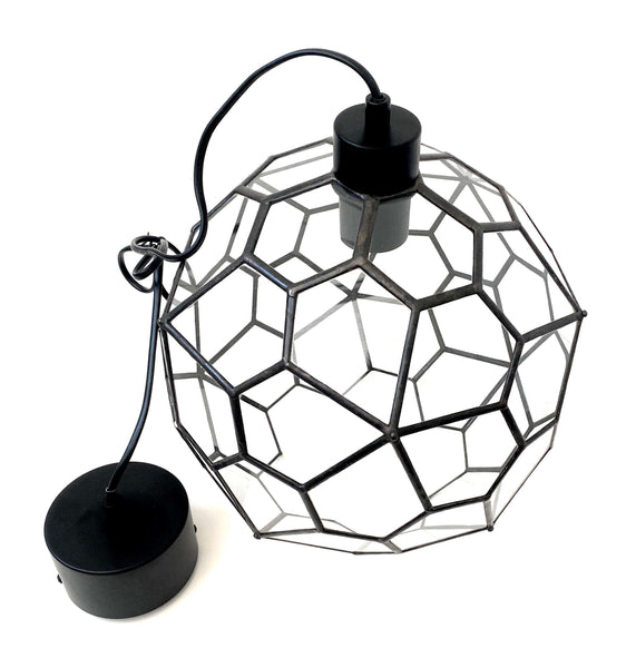 Handcrafted geometric glass pendant light by Lekoky, designed by Lenka in Southampton, England. This unique pendant light features a stunning black patina applied on soldering work and is made from 55 identical glass panes. Height adjustable 120cm Pendel ceiling light fitting with E27 Edison screw cap bulb holder included. Made to order and dispatched within 3 weeks with care and attention to detail.